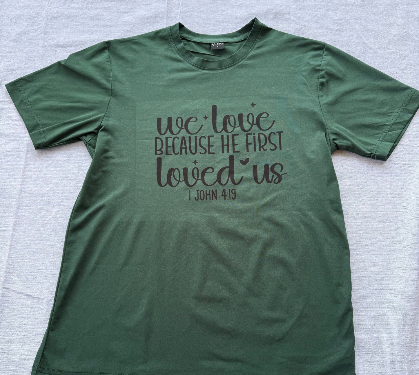 "We love because He first loved us" T-Shirt