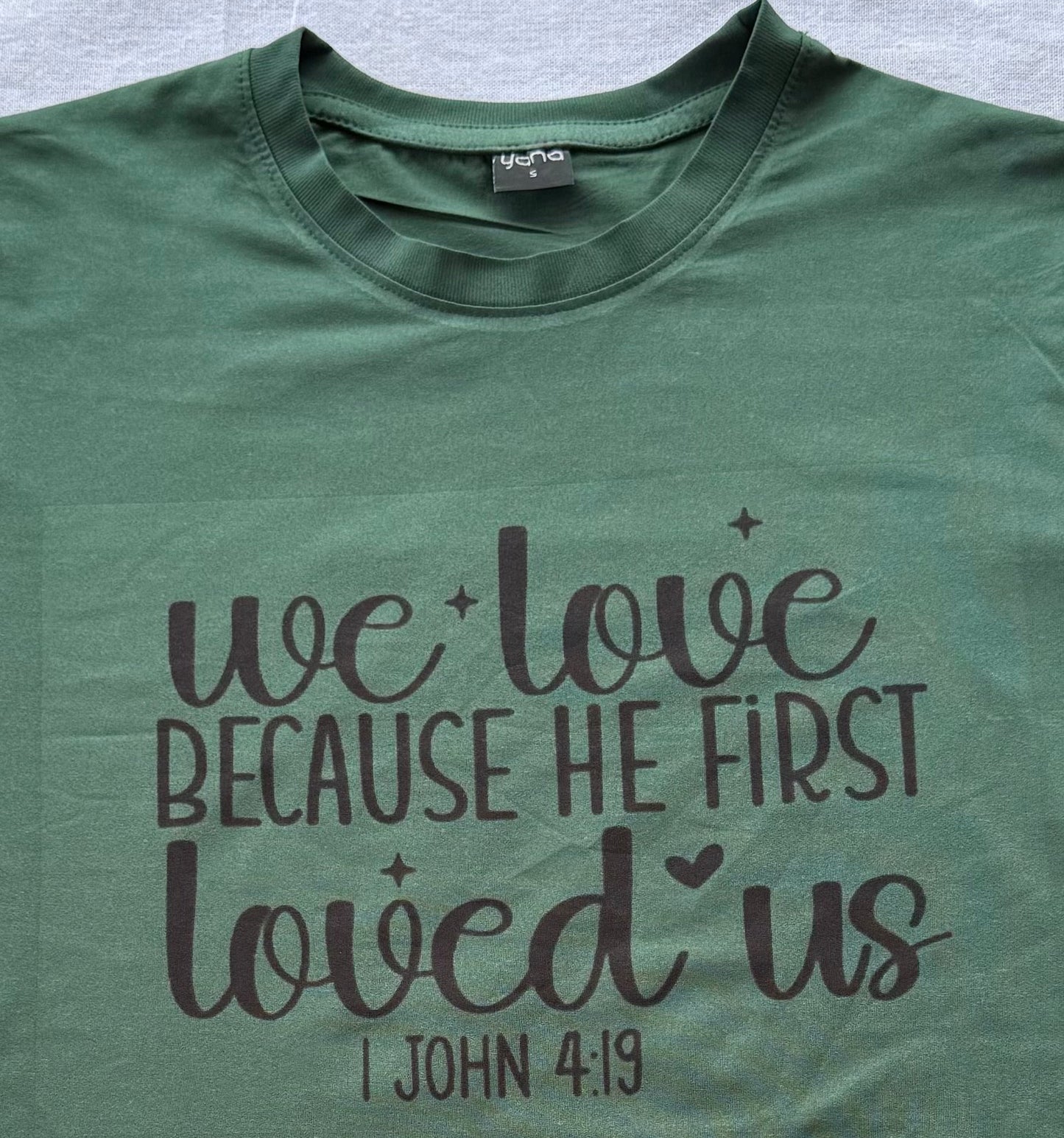 "We love because He first loved us" T-Shirt